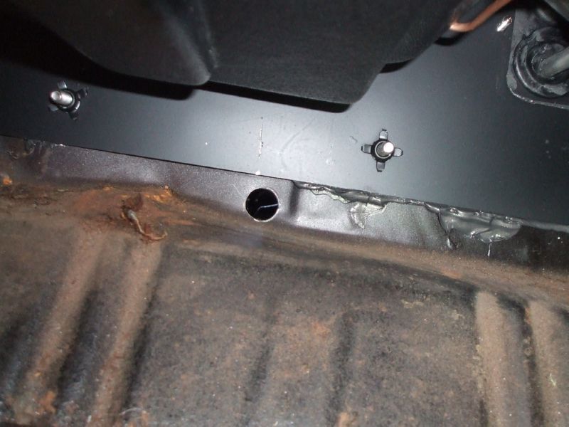 Hole in firewall for evaporator drain (used a step drill)