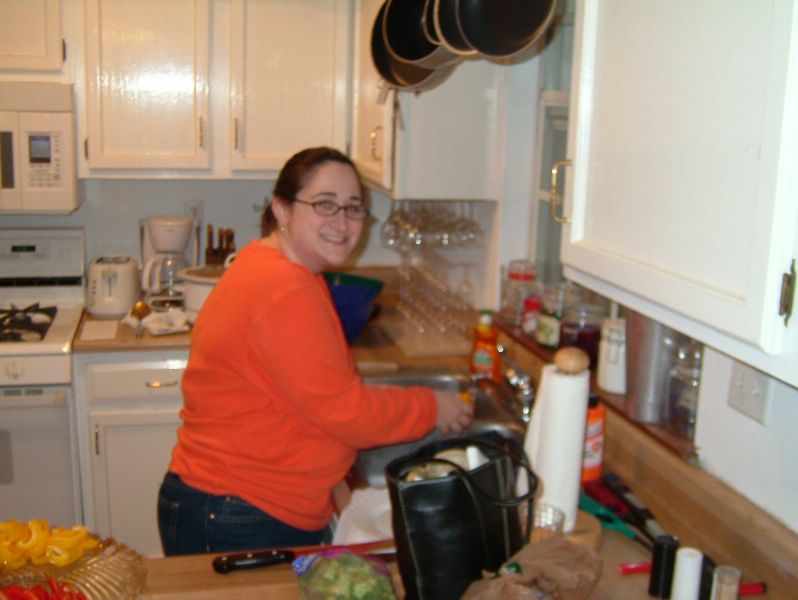 Tricia making food for the party